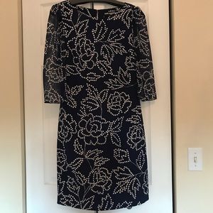 Navy shift dress with polka dot flowers